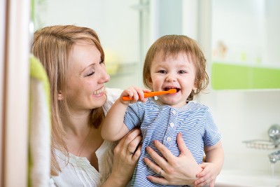 Mother and Child Brushing Teeth